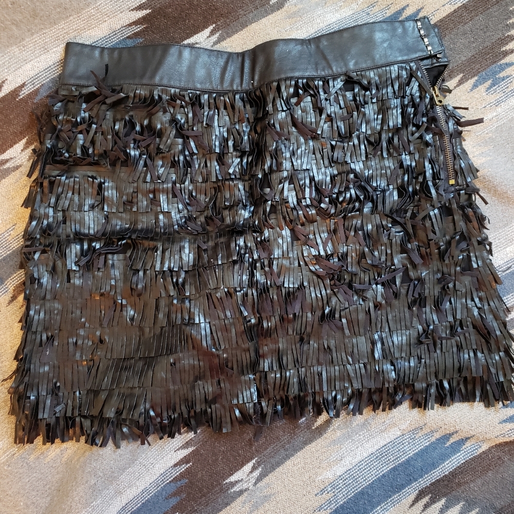 Boutique faux leather fringe skirt